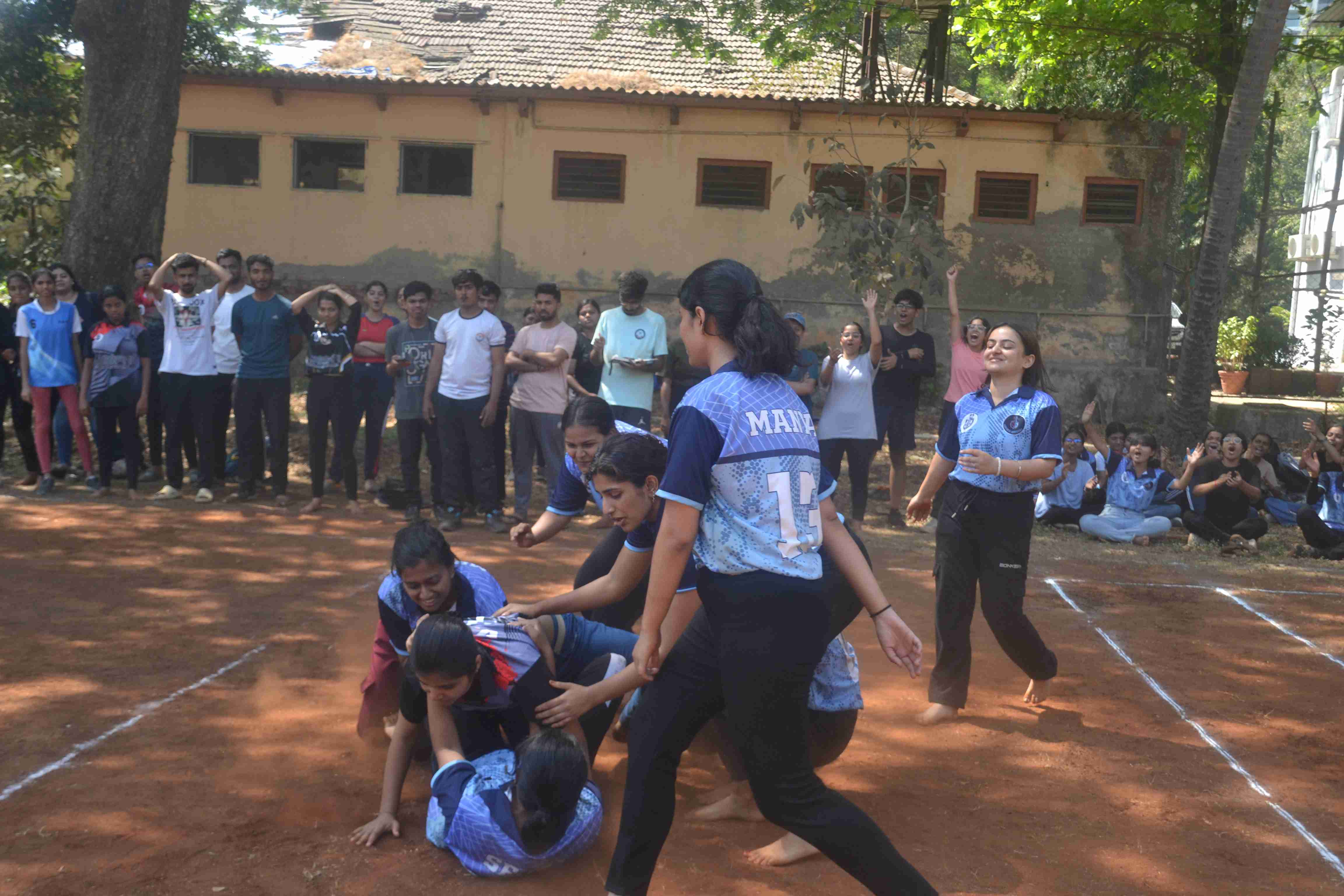 girls playing khoKho